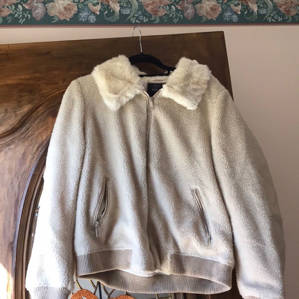 Shearling and faux fur coat